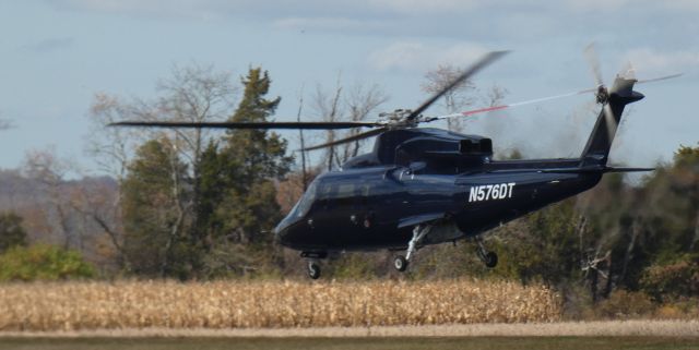 Sikorsky S-76 (N576DT) - Shortly after departure is this 2001 Sikorsky S-76C+ rotorcraft in the Autumn of 2024.