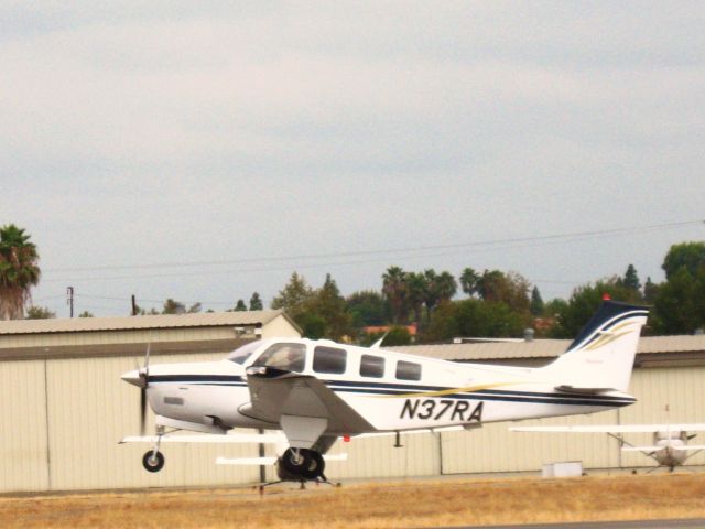 Beechcraft Bonanza (36) (N37RA) - Taking off from RWY 24