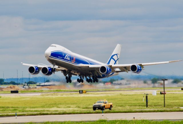 Boeing 747-200 — - West side observation area of DFW.  Just after rotation.  Nikon 400mm telephoto.