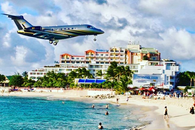 Embraer Legacy 550 (N1Y) - Our 1st Legacy 500 Landing in San Maarten to impress with its Aggressive Paint Scheme.