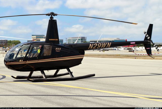 Robinson R-44 (N29WN) - N29WN sitting on ramp at KTPF