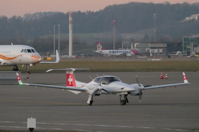Diamond Twin Star (HB-LMA) - At sunset on 5th Feb 2024: New aircraft for «European Flight Academy» in Swiss livery.