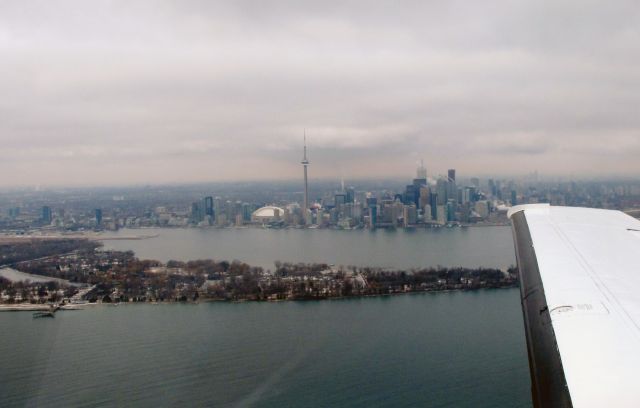 Beechcraft King Air 90 (N331JP) - Approaching Toronto City. Aircraft belongs to RELIANT AIR. They have the lowest fuel price on the Danbury (KDXR) airport.