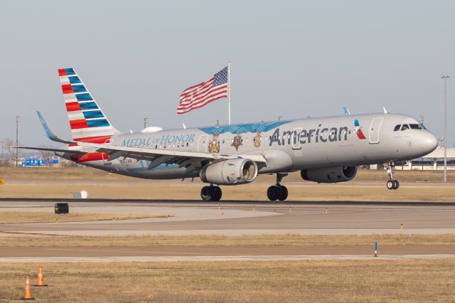 Airbus A321 (N167AN) - Flagship Valor operating as American 1820 greases it onto 18R at DFW from Ontario
