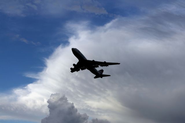 Boeing 747-200 — - Departing LHR.