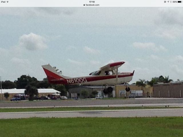 Cessna Commuter (N6100G) - Roxie Red Plane doing touch-n-goes.