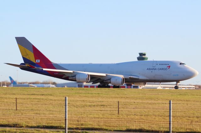 Boeing 747-400 (HL7413) - An Asiana Cargo B747-400F taking off from runway 22 at STN.br /br /Location: Stansted Airport.br /Date: 26.12.22 (dd/mm/yy).