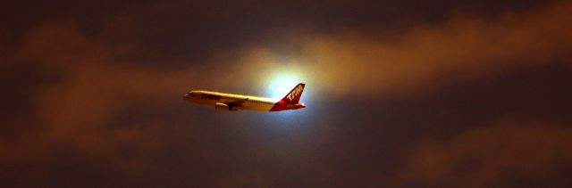— — - AIRBUS A320 OF TAM AIRLINES TAKEOFF IN VITÓRIA-ES AIRPORT BRAZIL.