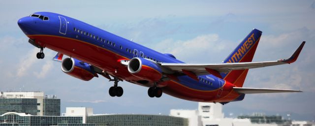 Boeing 737-800 (N8609A) - Departing from 17R.