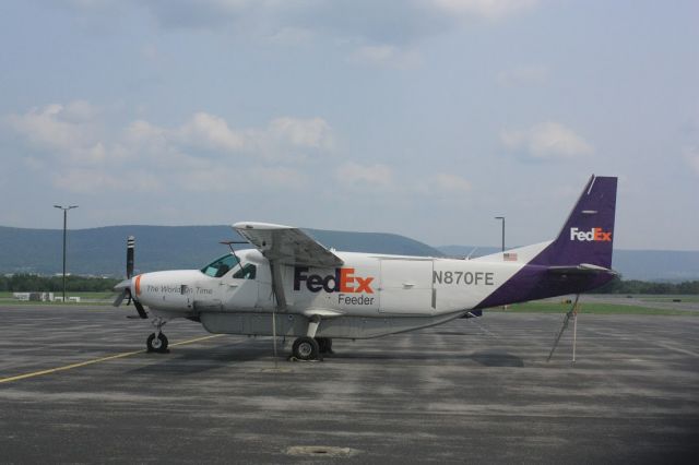 Cessna Caravan (N870FE) - Mount Nittany sitting proudly in the background.