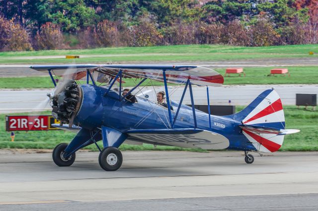 WACO OHIO YMF (N30169) - N30169 is a 1941 Waco Ohio YMF. This classic bird was taxiing to the runway for departure. I shot this with my Canon 100-400 IS II lens with the focal length of 176mm. Camera setting were 1/200 shutter, F10, ISO 160. POSITIVE VOTES AND POSITIVE COMMENTS ARE ALWAYS APPRECIATED. PLEASE CHECK OUT MY OTHER AIRCRAFT PHOTOS. Questions about this photo can be sent to Info@FlewShots.com