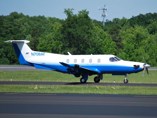 Pilatus PC-12 (N708AF) - RIGI INC taxiing to runway 02 at KJQF - 5/26/13