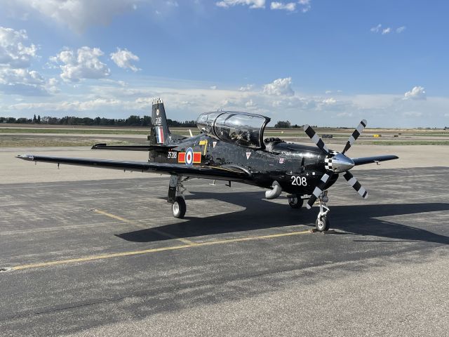 Embraer A-27 Tucano (N208PZ) - Here for a fuel stop