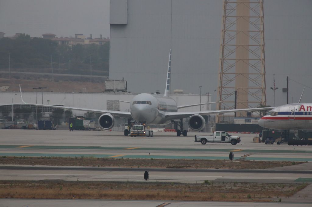 BOEING 767-300 (N386AA) - BEING TOWED TO THE GATE