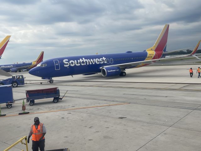 Boeing 737-800 (N8670A) - Pushback truck.