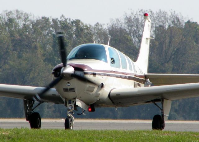 Beechcraft Bonanza (36) (N6552X) - Taxiing to the active at Downtown Shreveport.