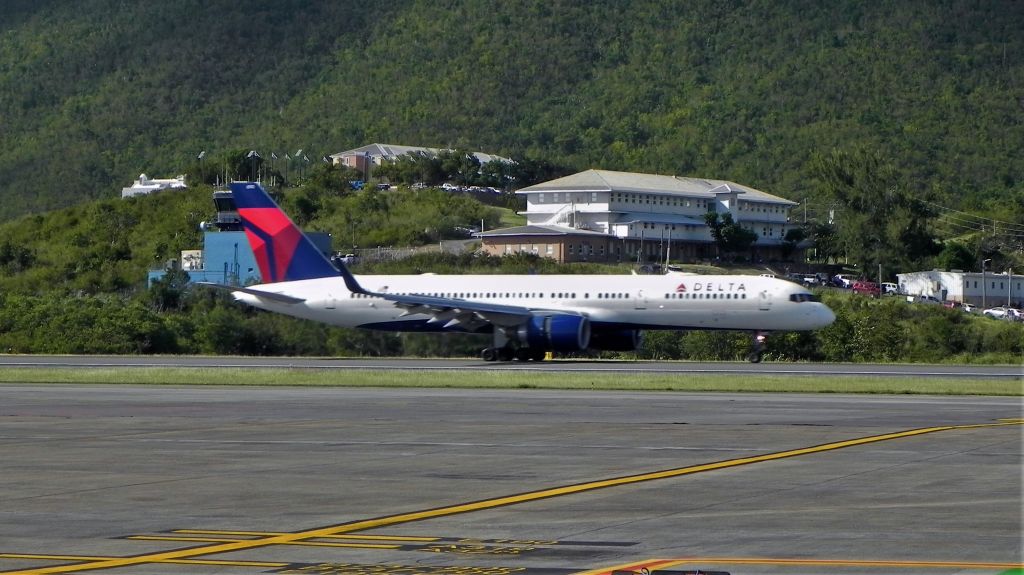 Boeing 757-200 (N690DL) - Rolling out on RWY 10 after arrival from ATL as DL661