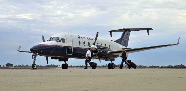 Beechcraft 1900 (N169GL) - Aircrew on their way to work