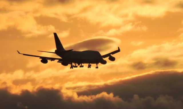 Boeing 747-400 (G-BNLP) - BA 747-400 on approach to BOS over Pemberton Point tonight, Hull MA