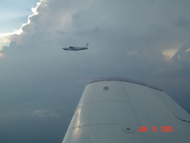 Piper Saratoga (N1057H) - Flying near level 5 storm 50 miles north of Mobile, AL.