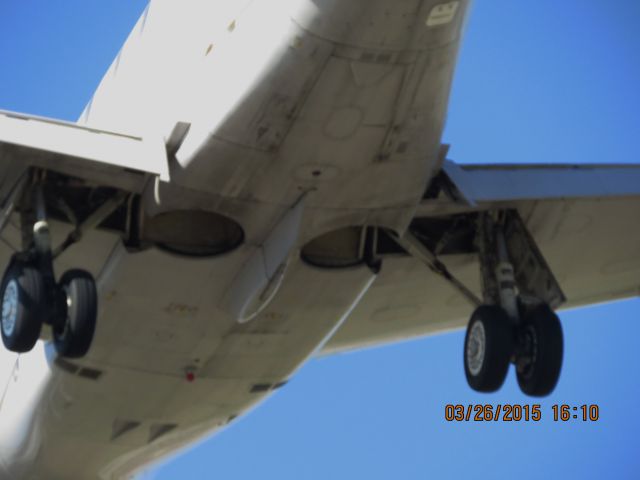 Embraer EMB-145XR (N11107) - Express Jet landing on runway 36R at Tulsa International from Houston.