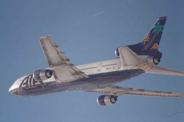 Lockheed L-1011 TriStar (N196AT) - Catching the final rays of a setting winter sun off of the nose.
