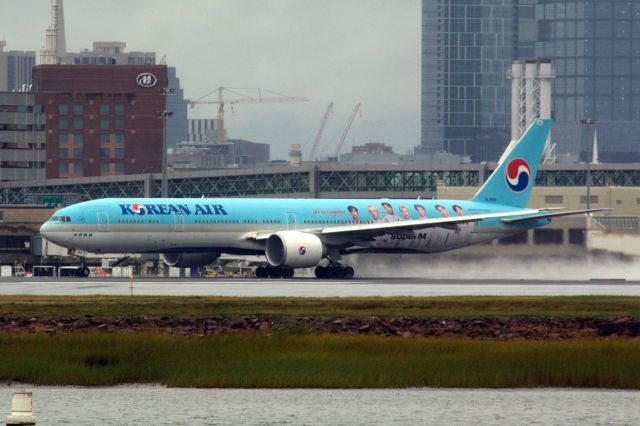 BOEING 777-300ER (HL8010) - Korean Air B777-300 in special Super M livery departing a rainy Boston Logan Airport's runway 15R on 8/29/20. 