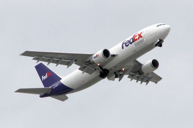 Airbus A300F4-600 (N668FE) - The first photo of N668FE in FAs gallery shows FDXs "Tianna" stowing the wheels in the wells as it climbs out from Reno Tahoe Internationals runway 34L.