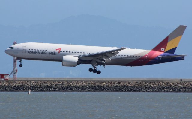 BOEING 777-200LR (HL7755) - Seconds from touching down