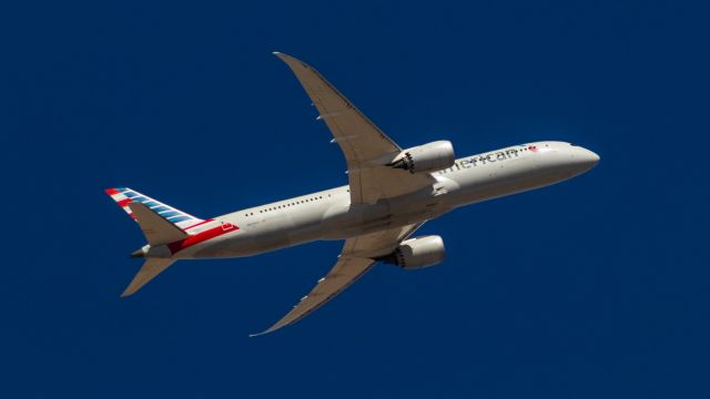 Boeing 787-9 Dreamliner (N828AA) - American Airlines 787-9 taking off from PHX on 2/19/22. Taken with a Canon 850D and Canon 75-300mm lens.