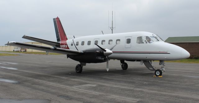 Embraer EMB-110 Bandeirante (N49RA) - A Royal Air Freight Embraer EMB-110P1 Bandeirante on the ramp under overcast at Boswell Field, Talladega Municipal Airport, AL - December 1, 2017.