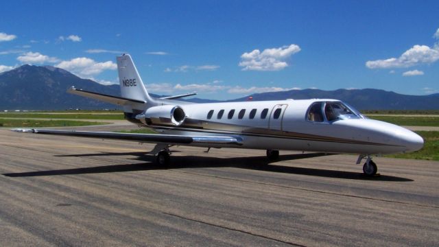 Cessna Citation V (N98E) - Taos Mountain rises behind N98E.