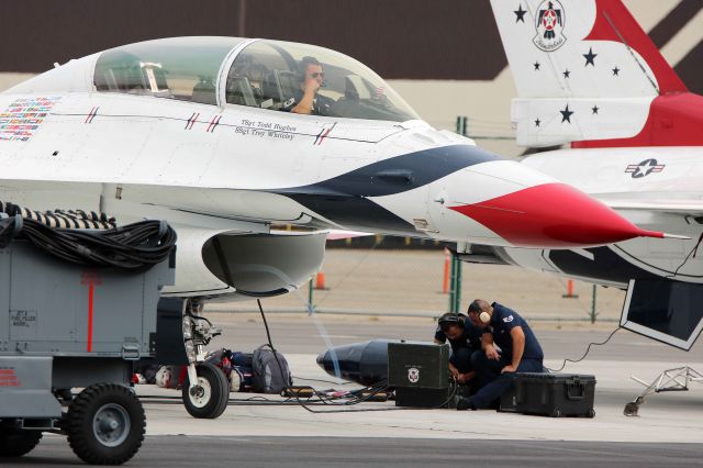 Lockheed F-16 Fighting Falcon (91-0479) - Thunderbird crews conduct an engine test run on 91-0479, c/n DM-34 at KCLE on 31 Aug 2017 as a vortex pulls the humid air into the engine. This shows just how powerful and dangerous jet engines can be.