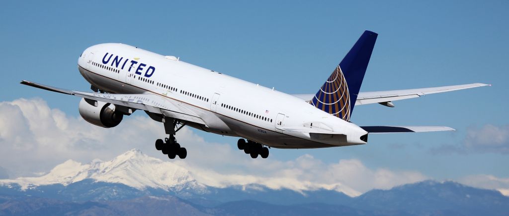 Boeing 777-200 (N781UA) - Departing from runway 25 for Honolulu.  Longs Peak in the background.