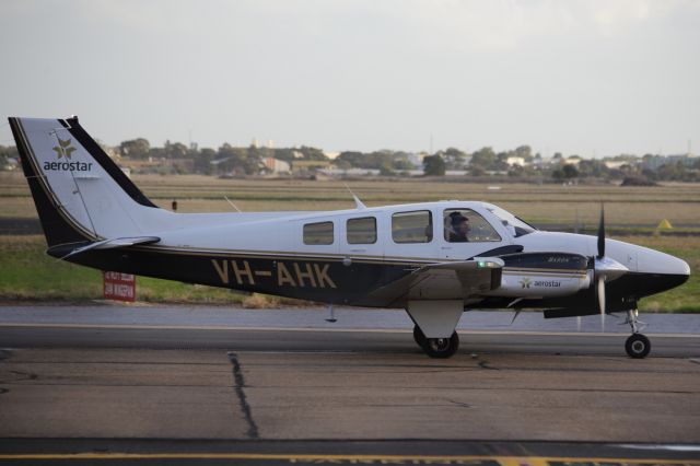VH-AHK — - VH-AHK G58 Baron heading back to storage yard at Parafield airport 