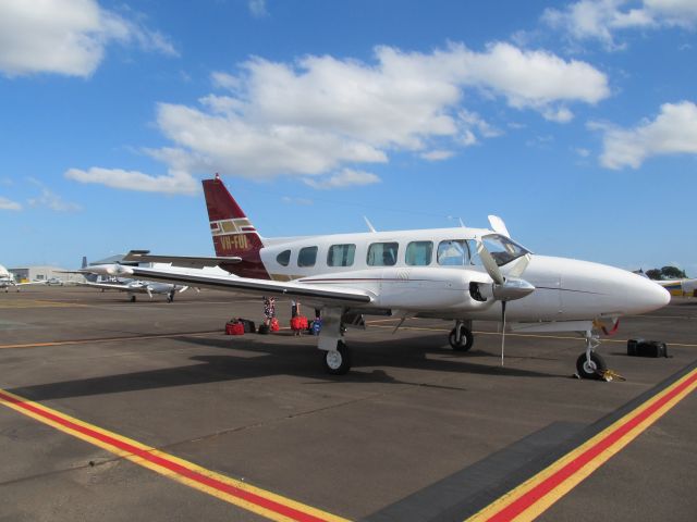 Piper Navajo (VH-FUI) - Unloading at Archerfield.