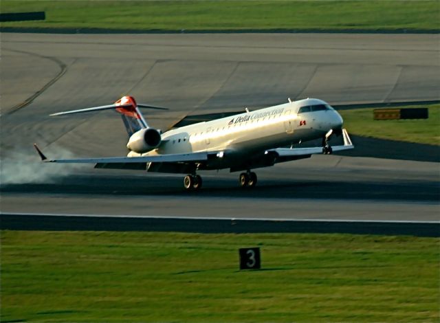 — — - early morning RJ arrival into KATL, taken from the balcony of the Renaissance Hotel..