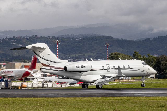 Bombardier Challenger 300 (N812DH) - I was taking pictures of airplanes