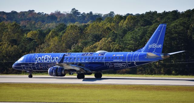 Embraer ERJ-190 (N304JB) - Landing on 23R ona  blustery late October day at RDU, 10/30/17.  Shared this because of the excellent view of the toilet.