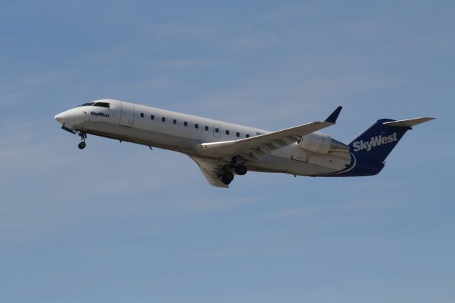 Canadair Regional Jet CRJ-200 (N951SW) - Departure from runway 24L on Easter Sunday