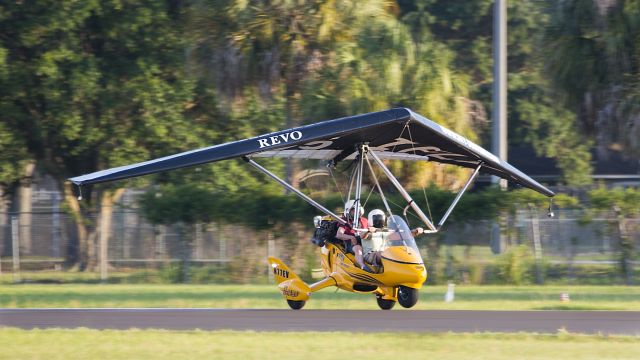 N77EV — - This is an evening landing of a Revo at Clearwater Airpark, Clearwater, Florida, USA. This is a Light Sport aircraft. A short time after I took this photo I flew it with its owner Dane Hauser (sky-surfing.com) out to the Clearwater Beach area (29 May 2016) for an evening joyride. Clearwater Beach is considered one of the top United States vacation destinations. A ride in this plane and the views make this area my top choice also. br /br /The plane was fast and agile. It cruised at about 110 mph, approach for landing at about 75, wheels squeaked at about 50 mph. The controls were responsive and light and it trimmed hands-free at cruise in level flight. The Rotax with a pusher prop supplied plenty of power. It took off quickly and climbed with authority. It completely demolished my former negative thoughts about "hang gliders" and how you needed to be a skinny olympic athlete to fly them. Dane and I each weighed about 200 lbs+ and the plane zipped into the sky effortlessly. It was a joy to fly. I cant wait to tell the Honey I want one, no, NEED ONE!