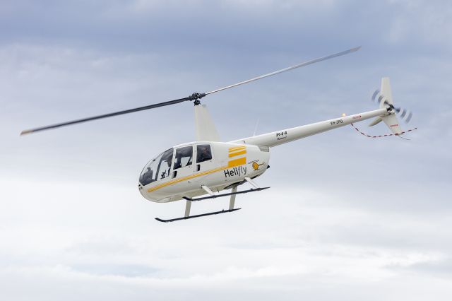 Robinson R-44 (VH-ZRQ) - Helifly (VH-ZRQ) Robinson R44 Raven I departing for a joy flight at Albury Airport.