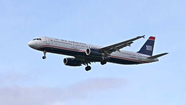 Airbus A321 (N540UW) - AWE1943 from KCLT on final to Rwy 16L on 2/16/14. (cn 4107).