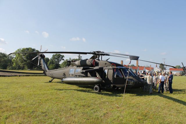 Sikorsky S-70 (0820105) - US Army & Air Force Firefighters receiving emergency egress training on a Sikorsky US Army UH-60M Black Hawk, 08-20105 from the 1st Battalion, 147 Aviation Regiment, WI ARNG, at Garrison Ft. McCoy, adjacent to Sparta/Ft. McCoy Airport, Sparta, (KCMY) USA – WI, during Warrior Exercise 86-13-01 (WAREX) on 16 Jul 2013.