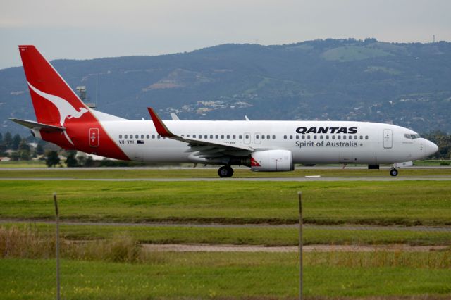 Boeing 737-800 (VH-VYI) - On taxiway heading for take-off on runway 05. Thursday, 19 June 2014.