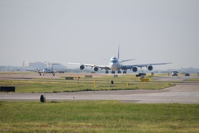 Boeing 747-200 (B-LJL) - Baby bear and papa bear taxiing to takeoff at DFW. 