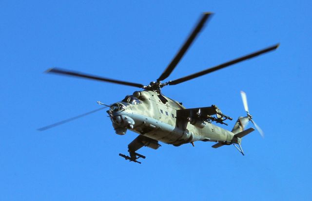 MIL Mi-25 (80-8616) - Aggressor real thing over MCAS Yuma AZ 4-18-2006. A scan from a Fujichrome Provia 100F slide.