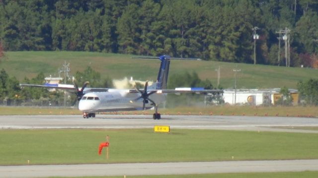 de Havilland Dash 8-400 (N341NG) - United 4792 departing to Newark.  Takenn December 11, 2014.