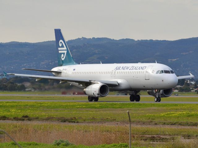 Airbus A320 (ZK-OJI) - On taxi-way heading for take off on runway 05, for flight home to Auckland, New Zealand. Thursday 12th July 2012.