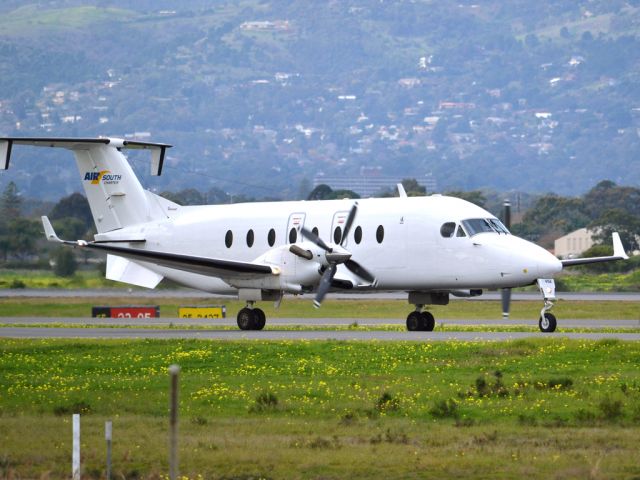 Beechcraft 1900 (VH-YOA) - On taxi-way heading for take off on runway 05. Thursday 12th July 2012.